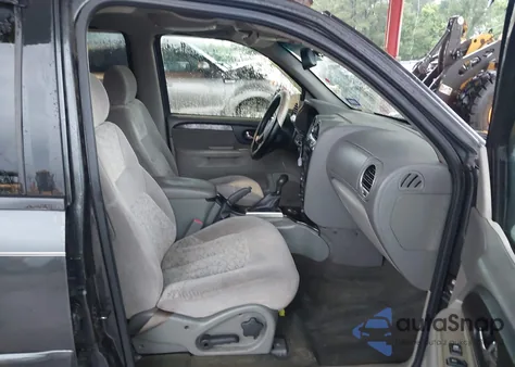 2003 GMC Envoy Sle z USA, uszkodzony, nr VIN 1GKDS13S932217946